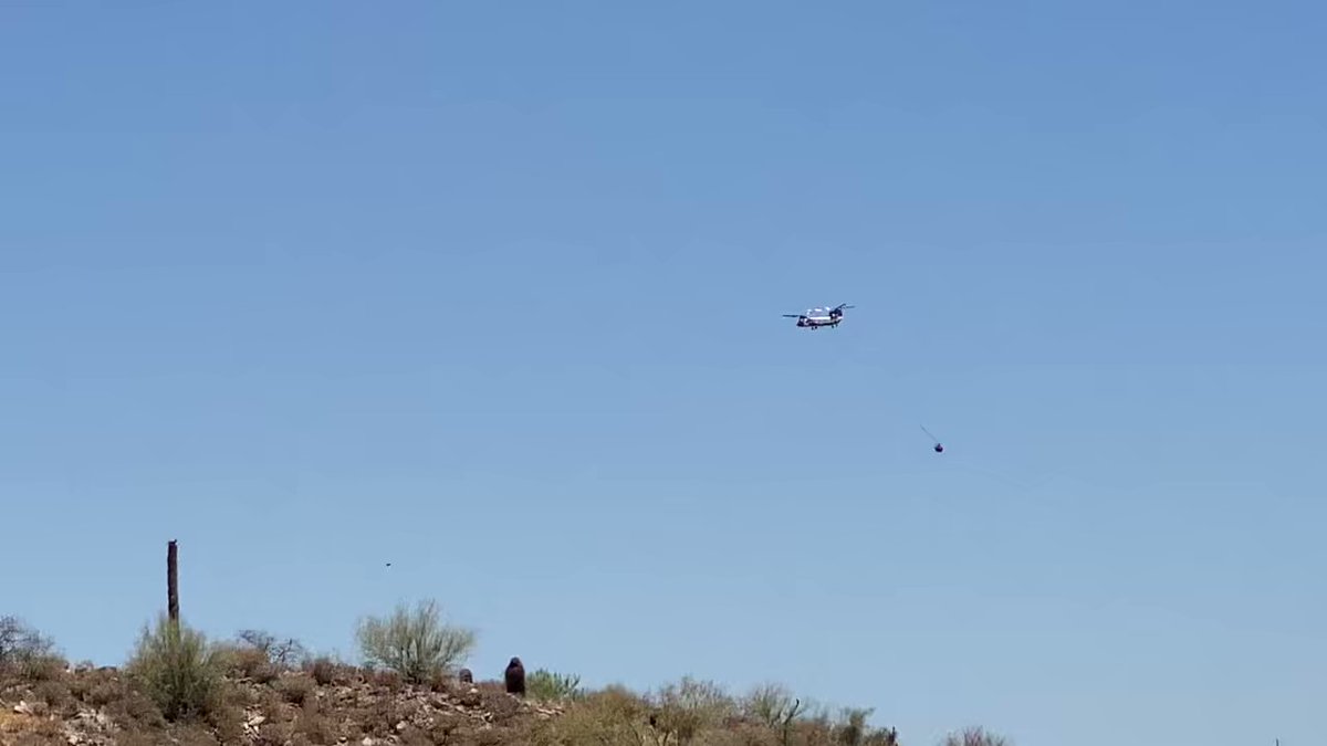 aircraft make a few bucket drops on the DiamondFire in far north Scottsdale. Evacuations are still in place