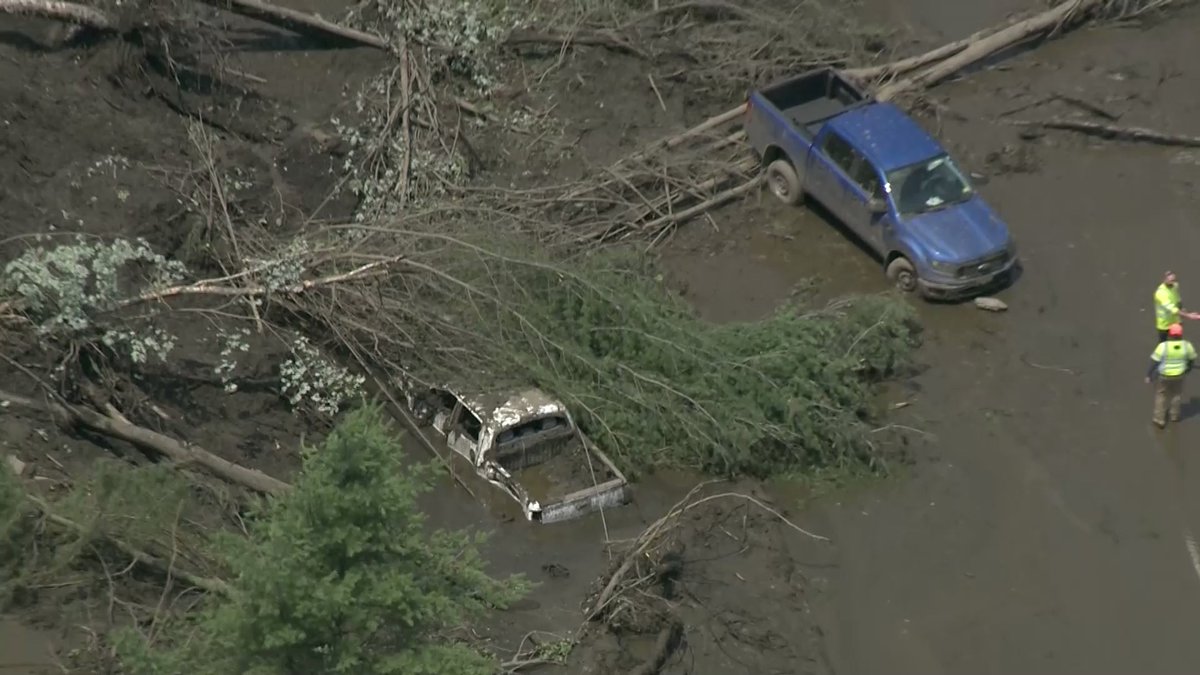 Sky 5 captured multiple vehicles that appeared to be stuck in dirt and debris after a landslide covered a road near Vermont's state capital