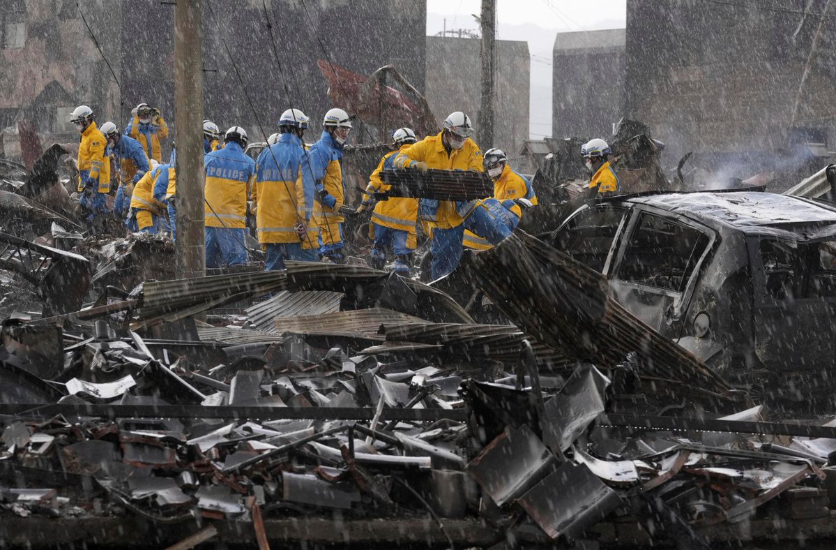 The death toll from a major earthquake in western Japan reached 100, as rescue workers fought aftershocks to carefully pull people from the rubble