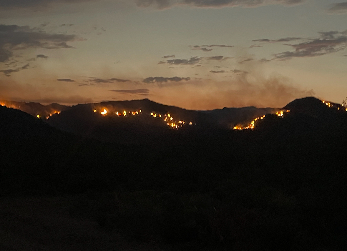 600 acres per fire operations.  Fire behavior has moderated, but remains active on east side near Hillside Road. Crews conducting firing ops along NE flank of fire as part of structure protection to the mine.