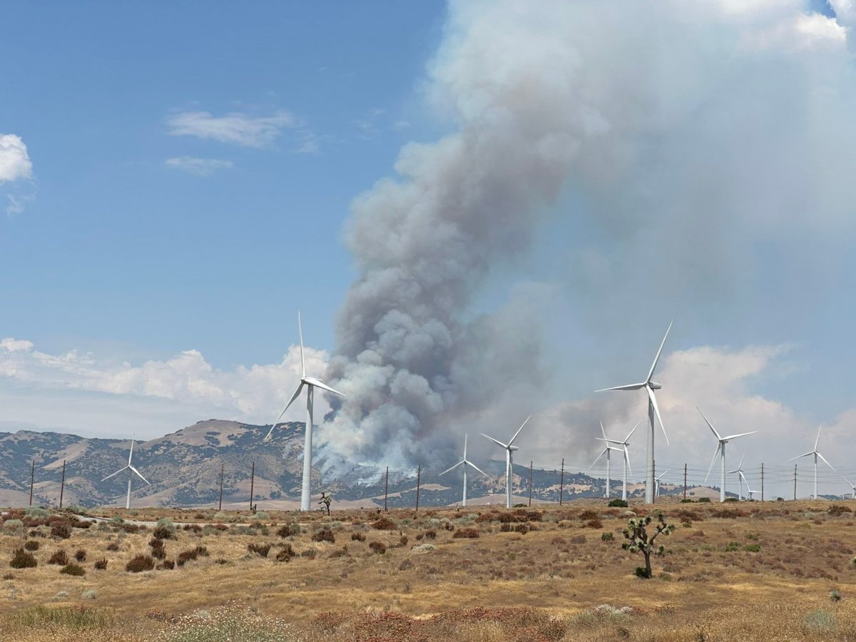 A vegetation fire in southern Kern County is threatening roads and structures, according to the Kern County Fire Department