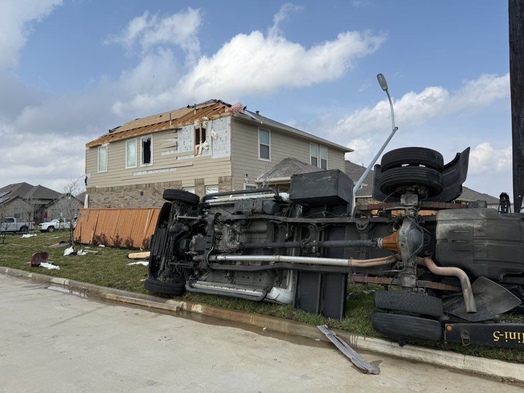 CONFIRMED TORNADO NORTH OF KATY This damage is in the Windward community. Numerous homes with severe damage. Vehicles overturned