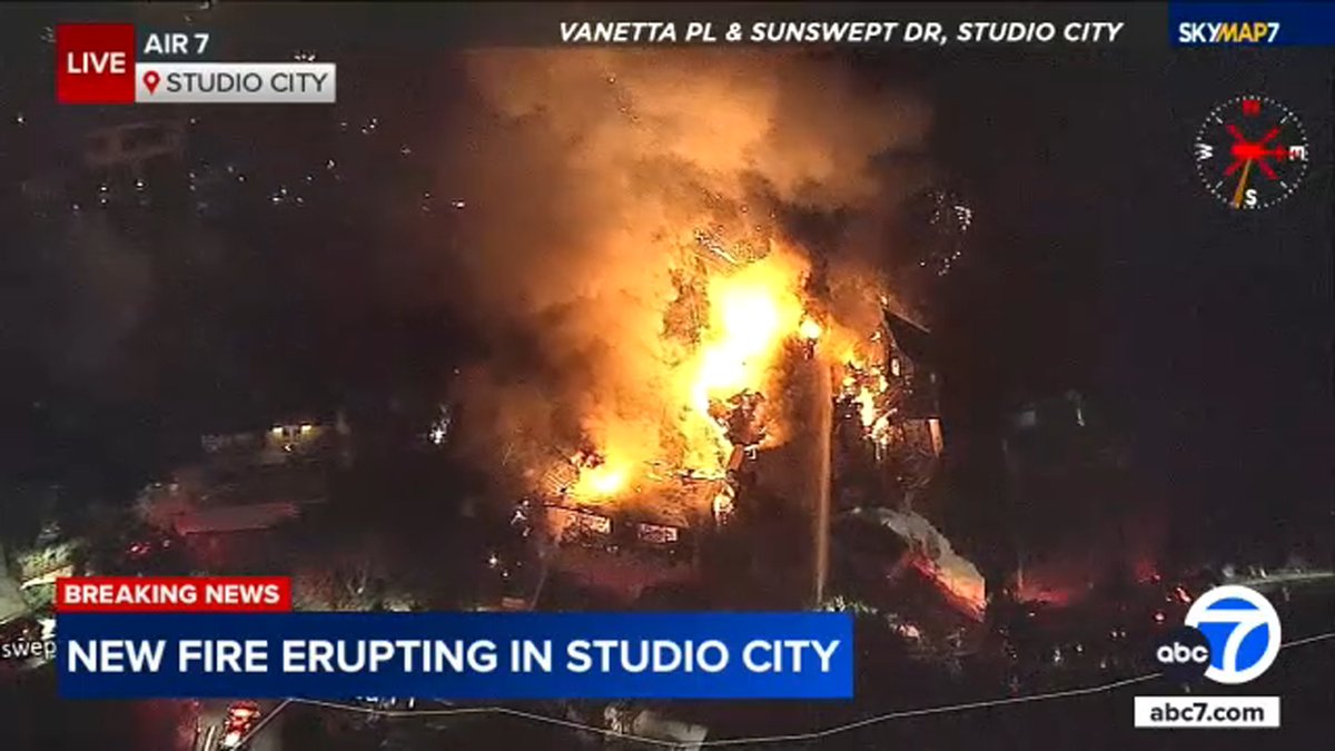 At least two structures are on fire as a new blaze erupts in Studio City.