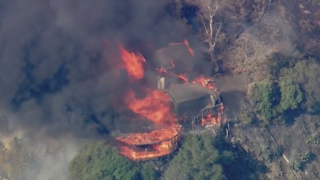 Team wildfire coverage as Palisades Fire burns homes in Brentwood.