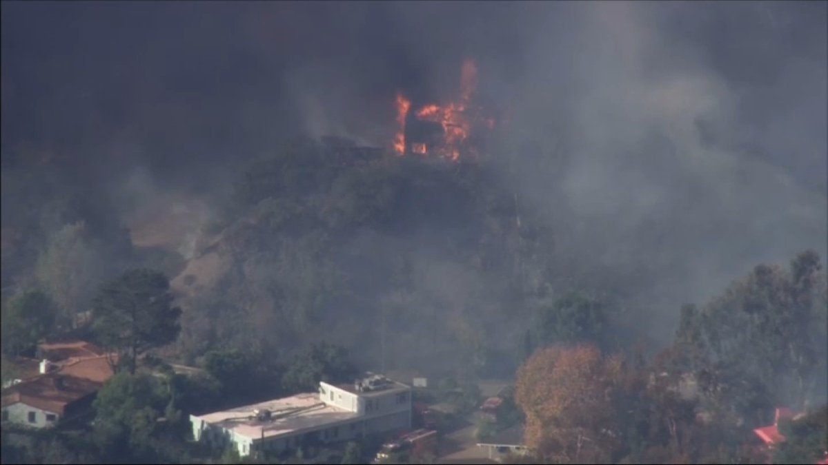 The PalisadesFire has reached Mandeville Canyon, destroying at least one home as it inches closer to others