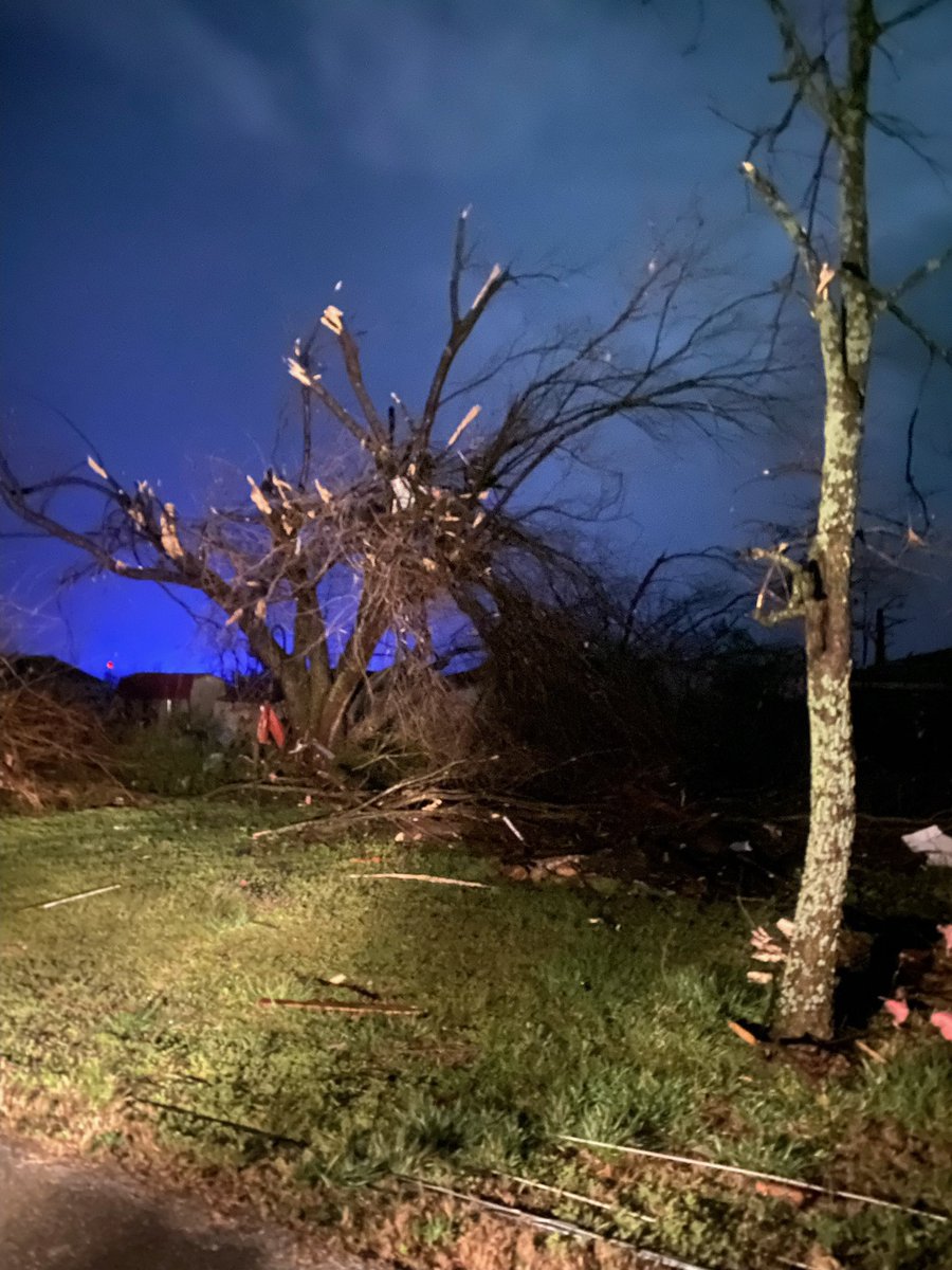 Buildings destroyed in Cave City, Arkansas, after a tornado-warned storm; emergency crews are responding