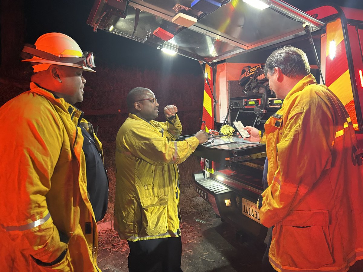 Fire Chief Damon Covington provides incident update at the scene of tonight‘s 3 alarm vegetation fire near Grass Valley and Skyline Boulevard. Fire is now contained forward progress stopped. Crews will be on scene and in the area throughout the night. 2) As of 10:10pm, the Forward Progress of this fire is stopped. Approximately 60 firefighters on scene, and crews have fire surrounded.
