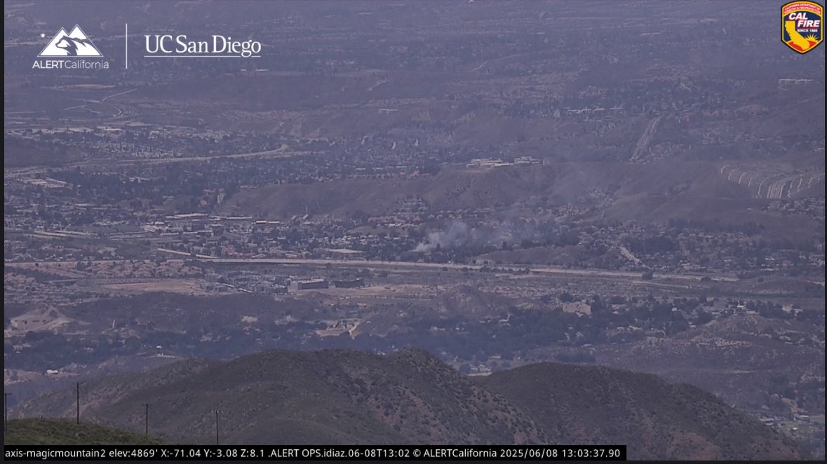 Smoke showing on cams.Santa Clarita Ca:904B(17615 Soledad Canyon Rd)Brush fire reported on a hill side,LACoFD sending a 1st alarm brush response