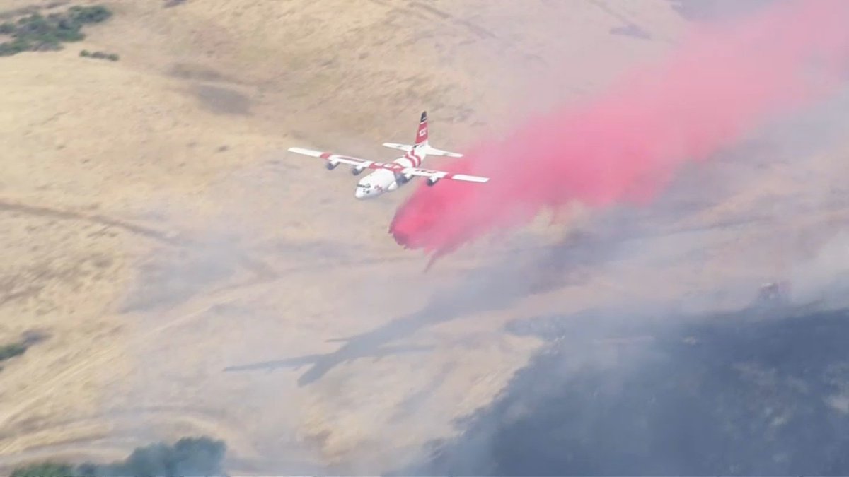 Firefighters are working to contain a brush fire in Rodeo