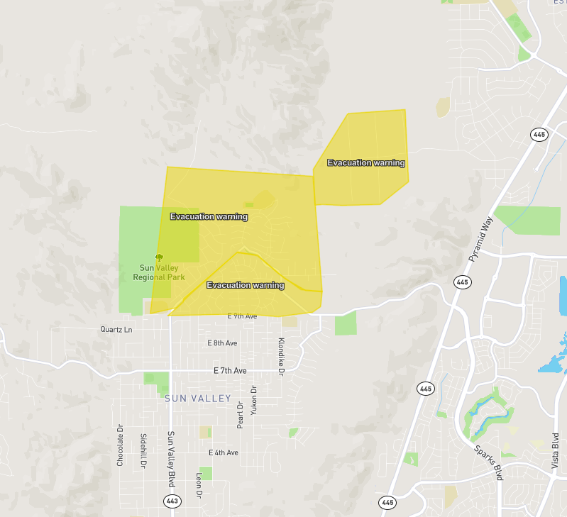 The evacuation zones have now been downgraded to evacuation warnings: Authorities have issued an urgent evacuation order due to a wildland fire in Sun Valley near Barrel Springs Road. Residents are being instructed to evacuate immediately