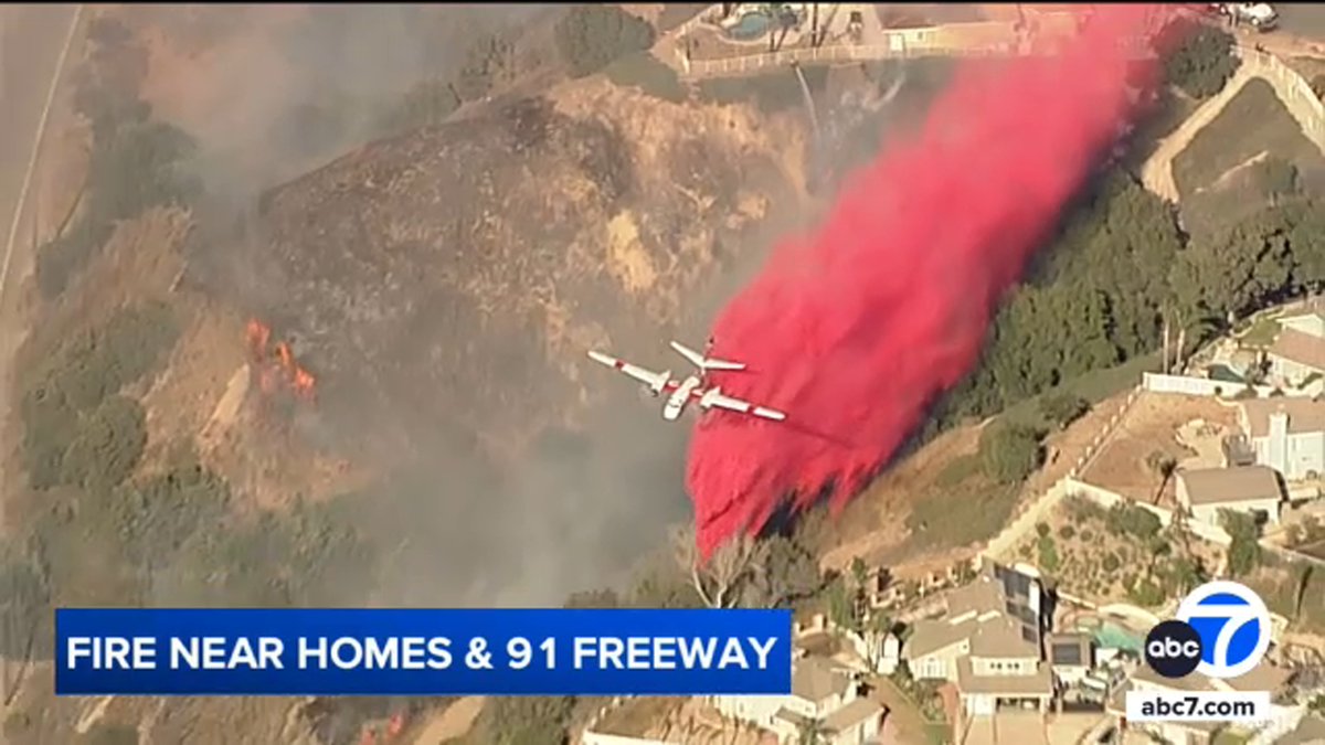 Evacuation orders downgraded after fire in Corona threatens homes