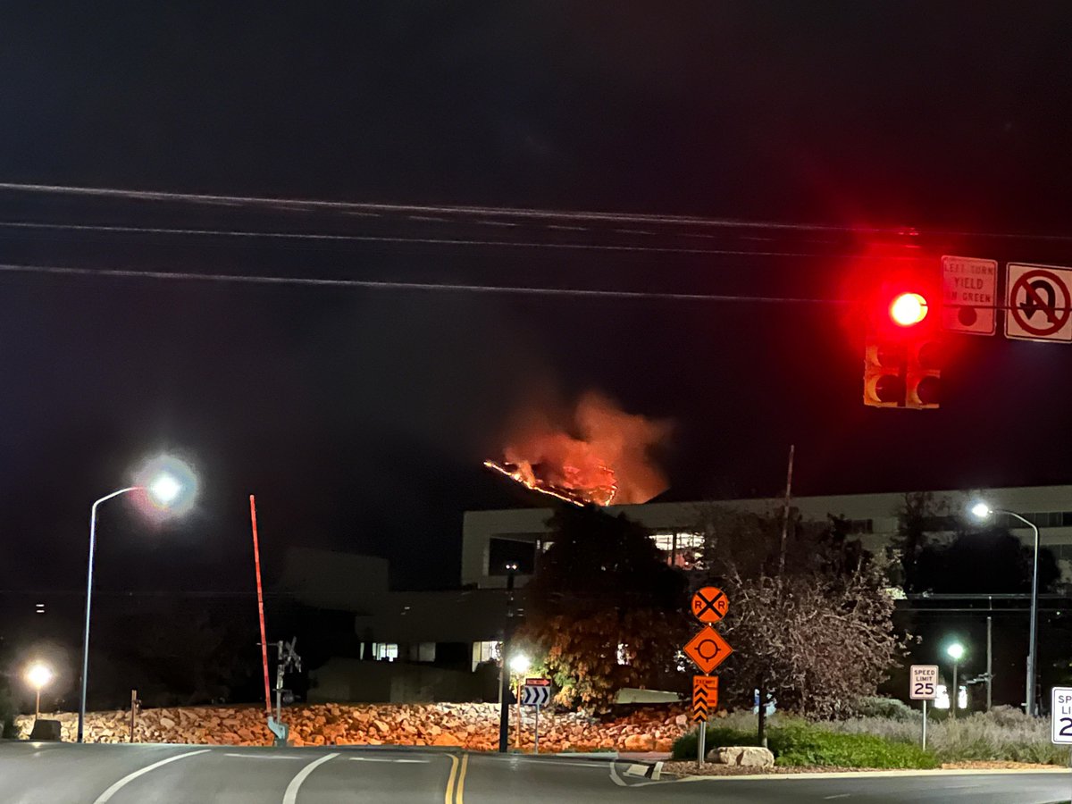 SaltLakeCityFire is working to locate a WildlandFire on the mountainside. Crews report the fire is likely in the Dry Creek area behind the UofU. According to the Battalion Chief, the fire exceeds 10 acres. BLM and air support have been notified. The blaze is visible