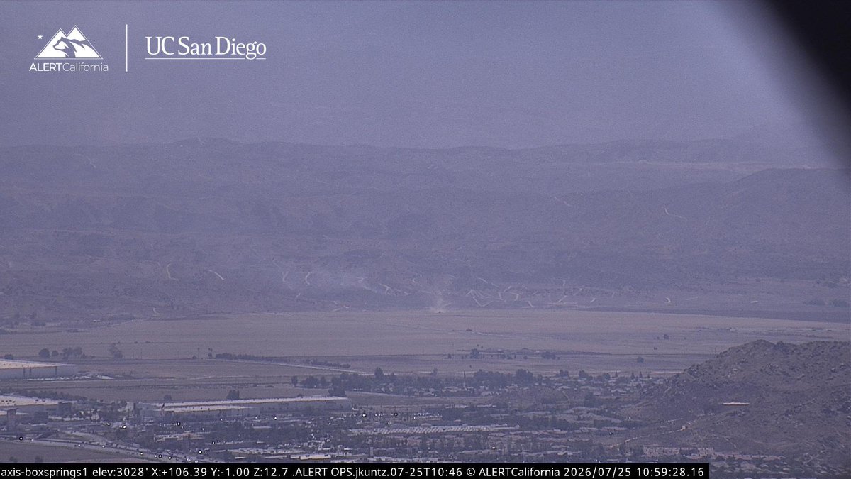 This is the VirginiaFire at Gilman Springs Road, East of Moreno Valley. Air Tanker 73 made a drop across the head and it's hung up on a ridge